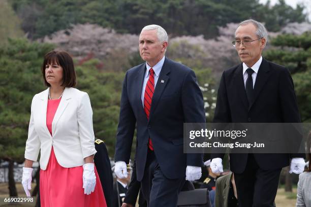 Vice President Mike Pence and his wife Karen Pence visit at Seoul National Cemetery on April 16, 2017 in Seoul, South Korea. During the three day...