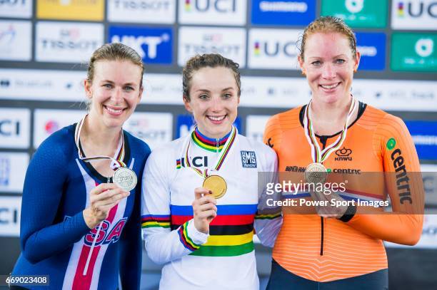 Elinor Barker of Great Britain celebrates winning in the Women's Points Race 25 km's prize ceremony with Sarah Hammer of USA and Kirsten Wild of the...