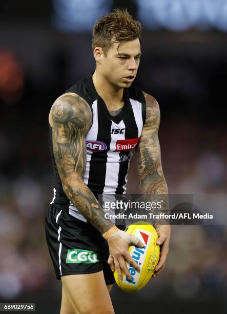 Jamie Elliott of the Magpies kicks the ball during the 2017 AFL round 04 match between the Collingwood Magpies and the St Kilda Saints at Etihad...