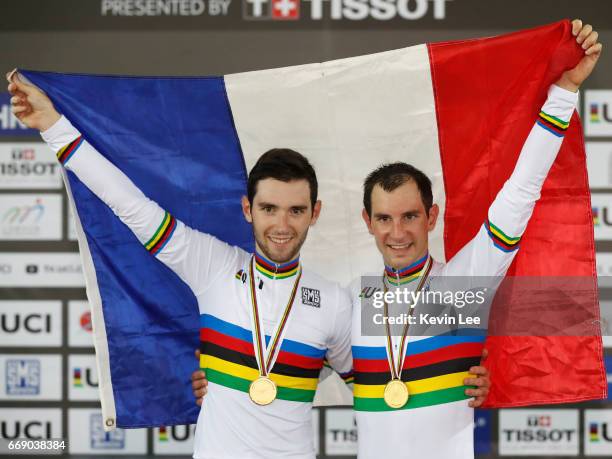 Benjamin Thomas and Morgan Kneisky of France poses with French national flag after winning Men's Madison Final on Day 5 in 2017 UCI Track Cycling...