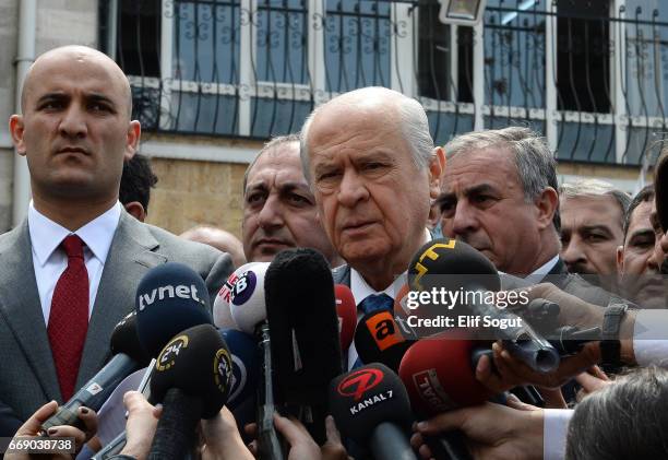 Nationalist Movement Party leader Devlet Bahceli speaks to media at a polling station during a referendum in Ankara, April 16, 2017 Turkey. Millions...