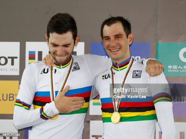 Benjamin Thomas and Morgan Kneisky of France poses with their gold medal after winning Men's Madison Final on Day 5 in 2017 UCI Track Cycling World...