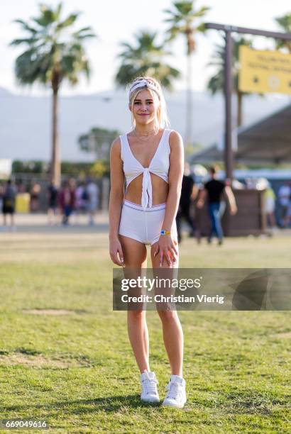 Coco wearing white shorts and cropped top during day 2 of the 2017 Coachella Valley Music & Arts Festival Weekend 1 on April 15, 2017 in Indio,...