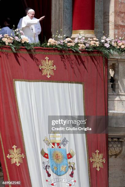 Pope Francis delivers his traditional 'Urbi et Orbi' Blessing - to the City of Rome, and to the World - from the central balcony overlooking St....