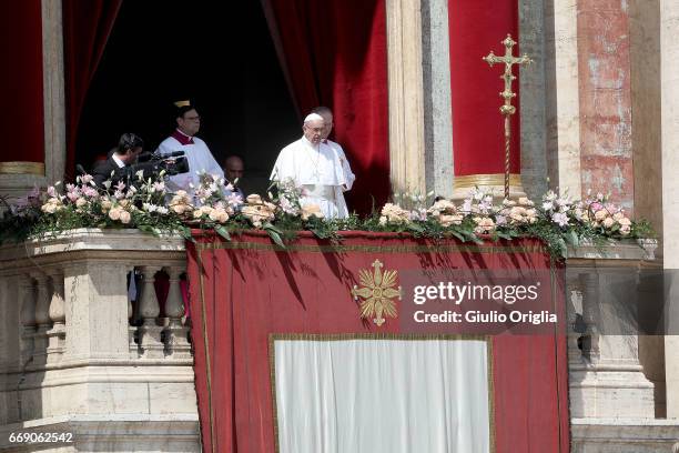 Pope Francis delivers his traditional 'Urbi et Orbi' Blessing - to the City of Rome, and to the World - from the central balcony overlooking St....