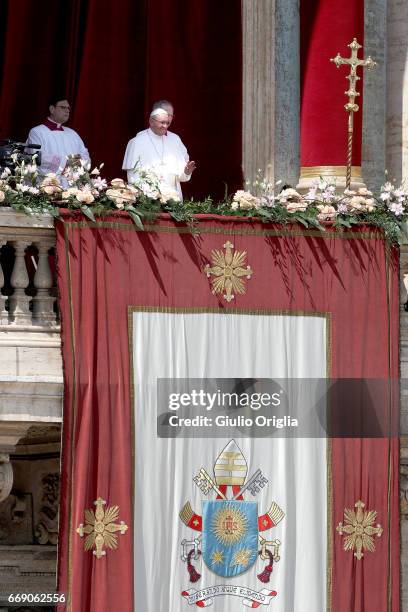 Pope Francis delivers his traditional 'Urbi et Orbi' Blessing - to the City of Rome, and to the World - from the central balcony overlooking St....