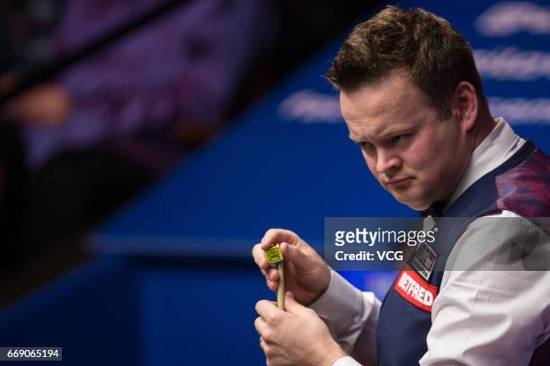Shaun Murphy of England reacts during his first round match against Yan Bingtao of China on day two of Betfred World Championship 2017 at Crucible...