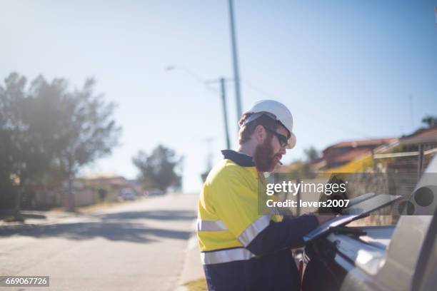 professional site manager working outdoors - human body part stock pictures, royalty-free photos & images