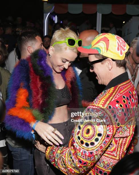 Katy Perry and Jeremy Scott attend the Moschino Candy Crush Desert Party hosted by Jeremy Scott on April 15, 2017 in Coachella, California.