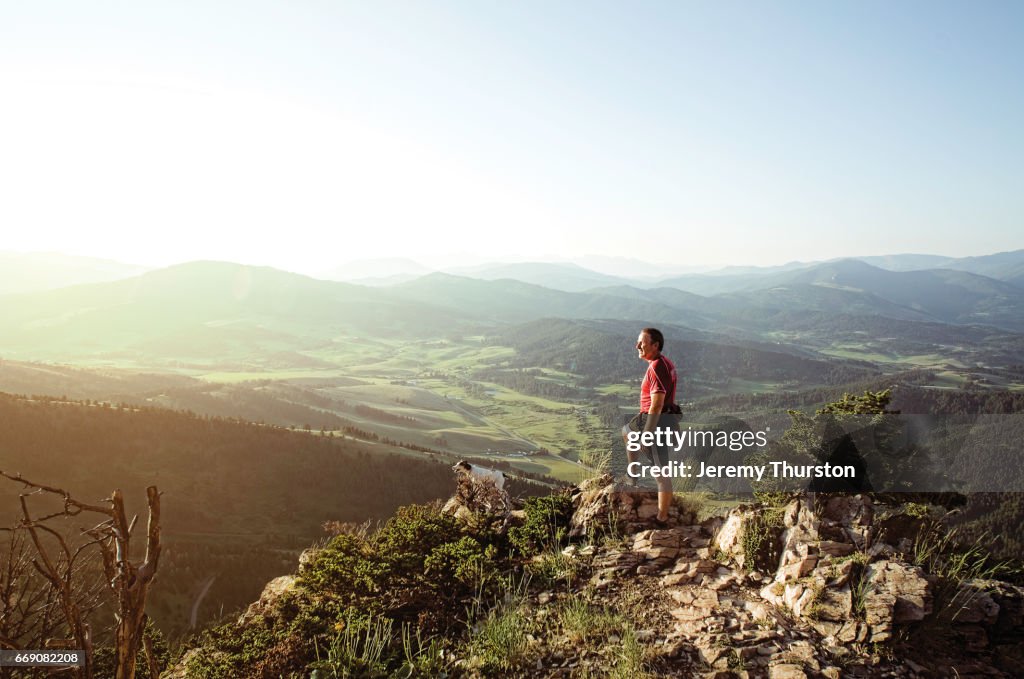 Hiker and his dog reach summit with majestic views