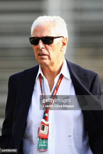 Marco Tronchetti, the Chief Executive Officer of Pirelli walks in the Paddock before the Bahrain Formula One Grand Prix at Bahrain International...