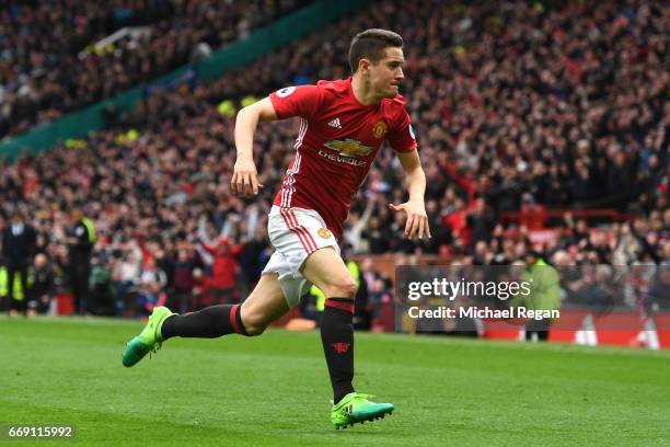 Ander Herrera of Manchester United celebrates scoring his sides second goal during the Premier League match between Manchester United and Chelsea at...