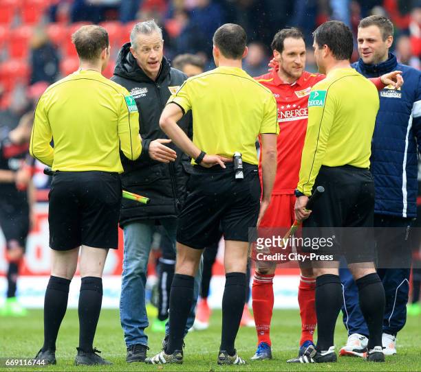 Coach Jens Keller, Stephan Fuerstner and assistant coach Sebastian Boenig of 1 FC Union Berlin with referee after the game between 1 FC Union Berlin...