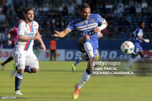 Bastia's French defender Alexander Djiku vies with Lyon's French midfielder Jordan Ferri during the French L1 Football match between Bastia and Lyon...