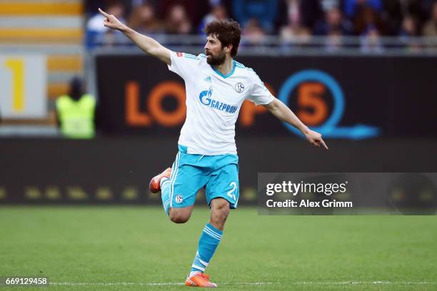 Coke of Schalke celebrates his team's first goal during the Bundesliga match between SV Darmstadt 98 and FC Schalke 04 at Stadion am Boellenfalltor...