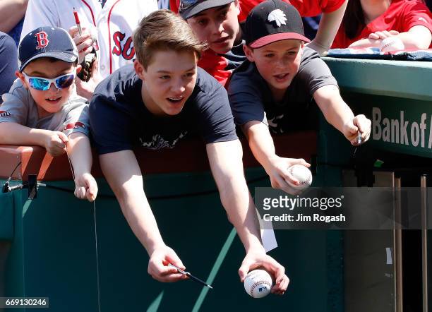 Red Sox fans react before a game with Tampa Bay Rays at Fenway Park on April 16, 2017 in Boston, Massachusetts.