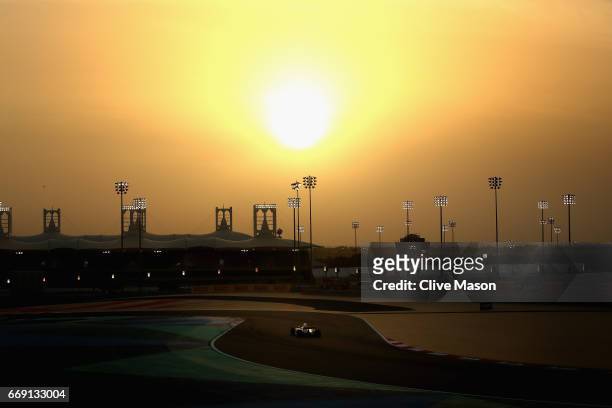 Lewis Hamilton of Great Britain driving the Mercedes AMG Petronas F1 Team Mercedes F1 WO8 on track during the Bahrain Formula One Grand Prix at...