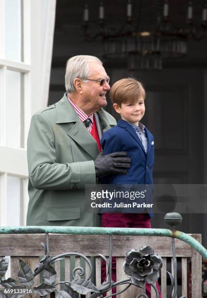 Prince Henrik of Denmark, with his grandson,Prince Vincent of Denmark, at Queen Margrethe of Denmark's 77th Birthday Celebrations, at Marselisborg...