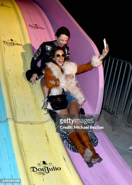 Model Alessandra Ambrosio and guest attend The Levi's Brand Presents NEON CARNIVAL with Tequila Don Julio on April 15, 2017 in Thermal, California.