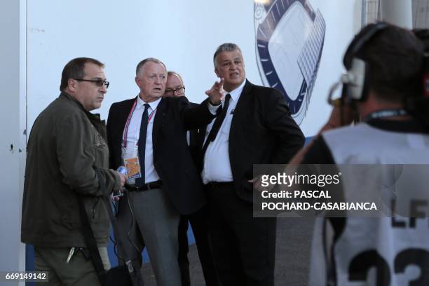 Lyon's French president Jean-Michel Aulas talks with officials after the French L1 football match Bastia vs Lyon on April 16, 2017 in the Armand...