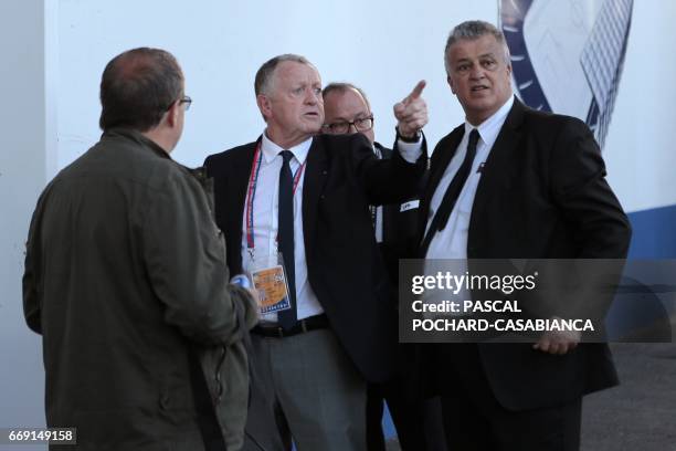 Lyon's French president Jean-Michel Aulas talks with officials after the French L1 football match Bastia vs Lyon on April 16, 2017 in the Armand...