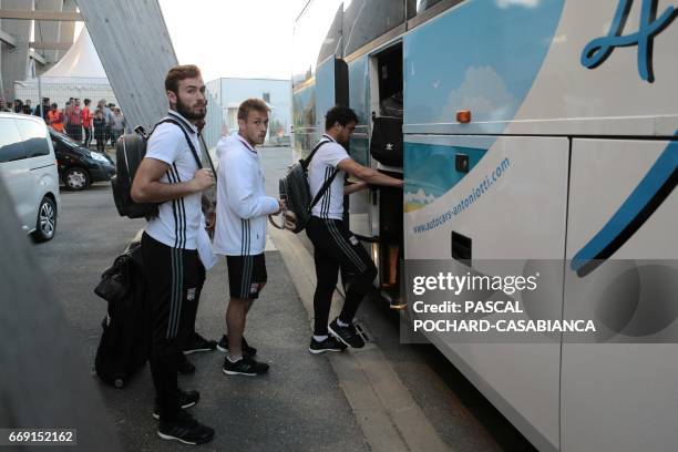 Lyon's players get into their bus after the French L1 football match Bastia vs Lyon on April 16, 2017 in the Armand Cesari stadium in Bastia on the...