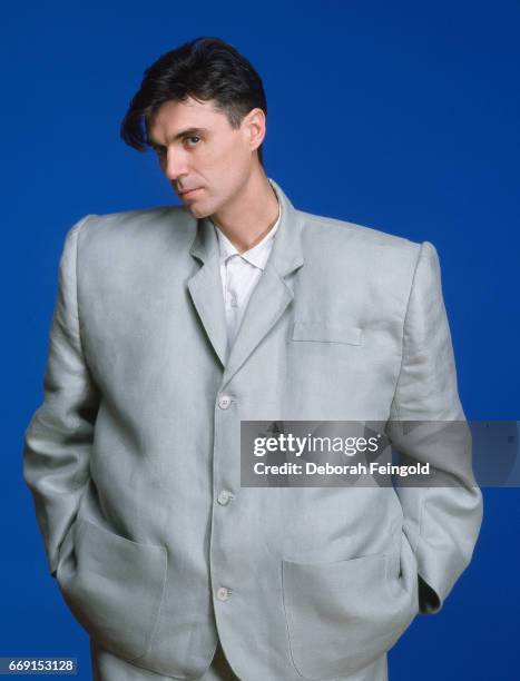 American singer-songwriter David Byrne poses wearing the 'Big Suit' he wore in the 1984 film 'Stop Making Sense'. The suit is by designer Gail...