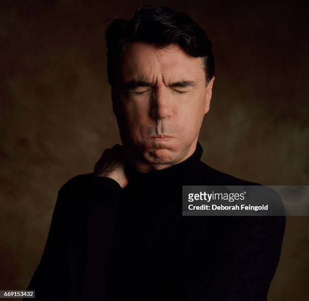 Deborah Feingold/Corbis via Getty Images) NEW YORK Singer, musician and guitarist David Byrne poses for a portrait in 1984 in New York City, New York.