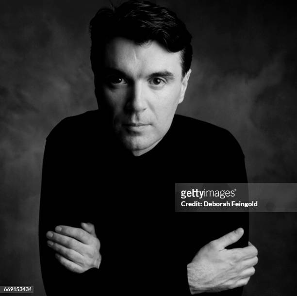 Deborah Feingold/Corbis via Getty Images) NEW YORK Singer, musician and guitarist David Byrne poses for a portrait in 1984 in New York City, New York.
