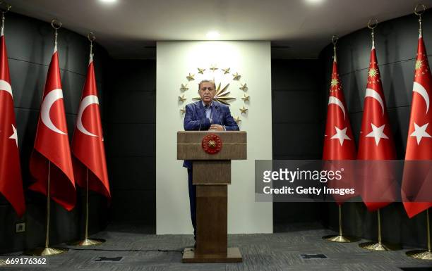 Turkey's President Recep Tayyip prepares to make a statement on April 16, 2017 in Ankara, Turkey. President Erdogan declared victory in Sunday's...