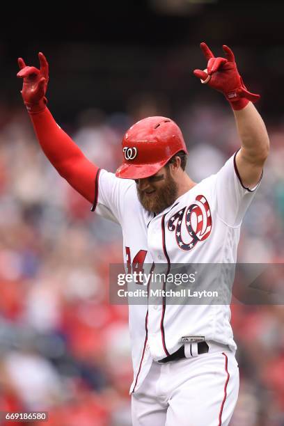 Bryce Harper of the Washington Nationals celebrates hitting a game winning three run home run in the ninth inning after a baseball game against the...