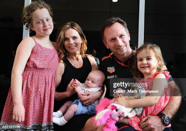 Red Bull Racing Team Principal Christian Horner with his wife Geri Horner and their children Bluebell, Montague and Olivia in the Paddock before the...