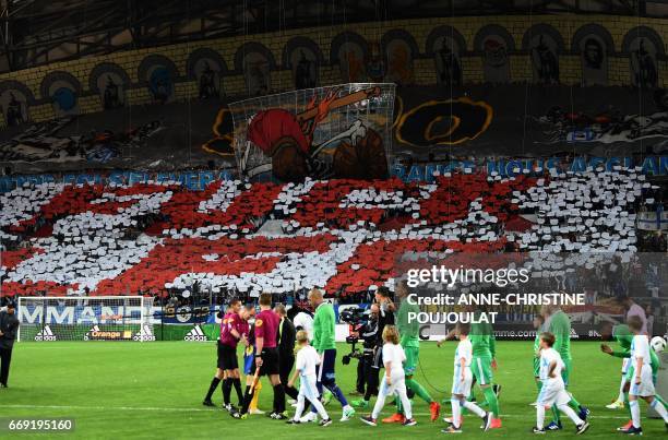 This picture taken on April 16 shows a tifo reading "Fuck LFP" at the Velodrome stadium in Marseille, southern France, prior to the French L1...
