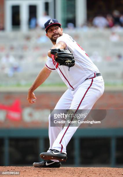 Josh Collmenter of the Atlanta Braves throws a ninth inning pitch against the San Diego Padres at SunTrust Park on April 16, 2017 in Atlanta, Georgia.