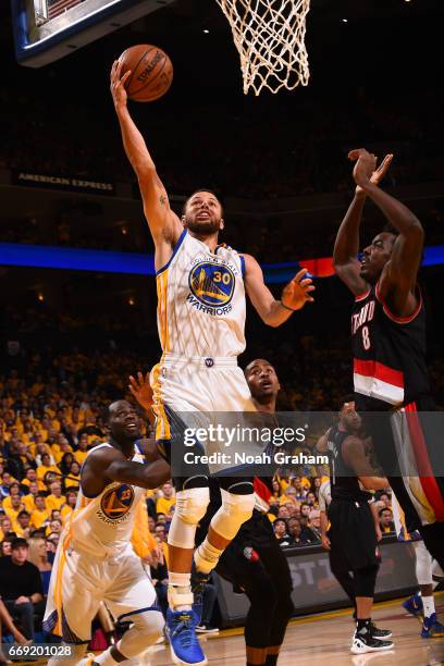 Stephen Curry of the Golden State Warriors goes up for a lay up against the Portland Trail Blazers during the Western Conference Quarterfinals of the...