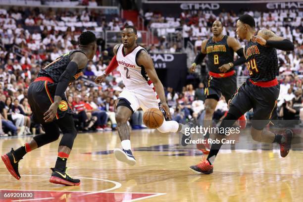 John Wall of the Washington Wizards drives the basket against the Atlanta Hawks in Game One of the Eastern Conference Quarterfinals during the 2017...