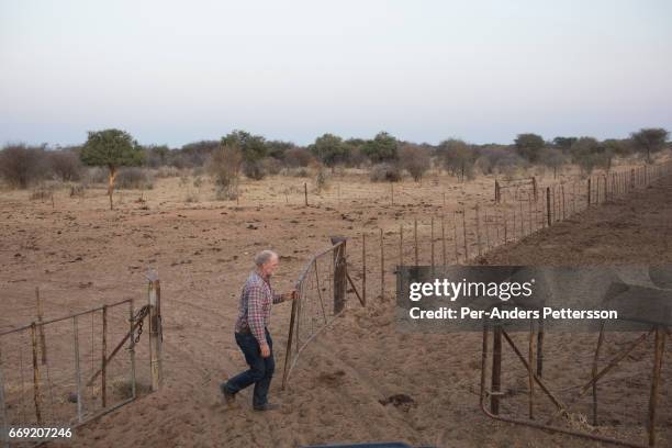 German farmer W.G. Diekmann stands on the border of his land, at his massive 20,000 hectares farm named Hamakari on August 14, 2016 outside...