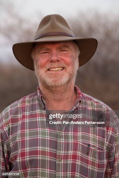 German farmer W.G. Diekmann poses for a portrait at the border of his land, at his massive 20,000 hectares farm named Hamakari on August 14, 2016...