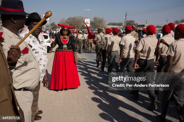 Herero groups parade in traditional military uniforms during a march when commemorating fallen chiefs killed in battles with Germans on August 12,...