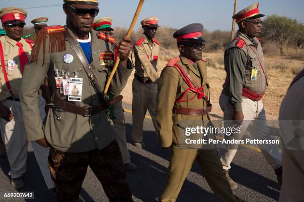 Herero groups parade in traditional military uniforms during a march when commemorating fallen chiefs killed in battles with Germans on August 12,...