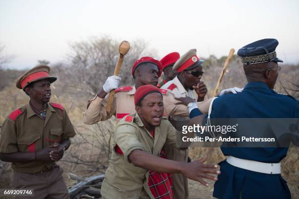 Herero men dressed in military uniforms, rehearse before a parade when commemorating fallen chiefs killed in battles with Germans on August 12, 2016...