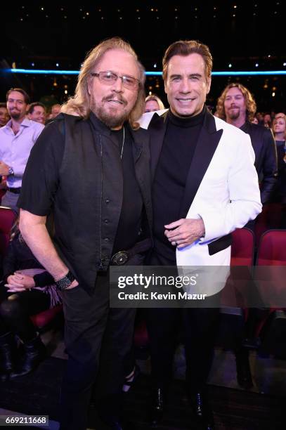 Singer Barry Gibb and actor John Travolta attend "Stayin' Alive: A GRAMMY Salute To The Music Of The Bee Gees" on February 14, 2017 in Los Angeles,...