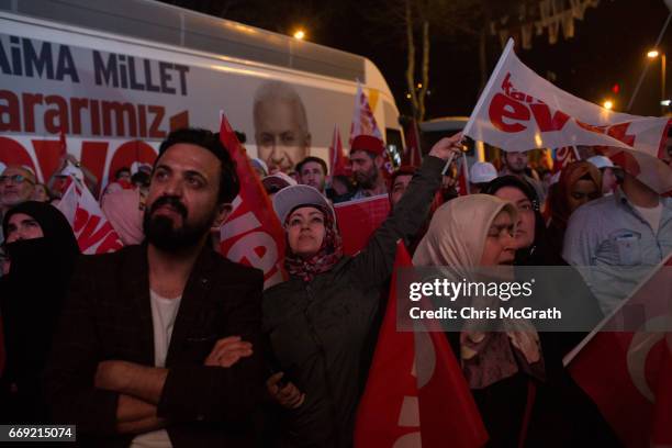 People celebrate the 'Evet' vote result outside AK Party headquarters on April 16, 2017 in Istanbul, Turkey. According to unofficial results 51.21%...