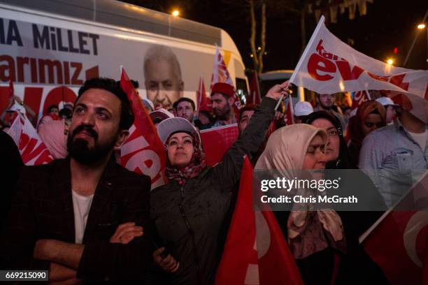 People celebrate the 'Evet' vote result outside AK Party headquarters on April 16, 2017 in Istanbul, Turkey. According to unofficial results 51.21%...