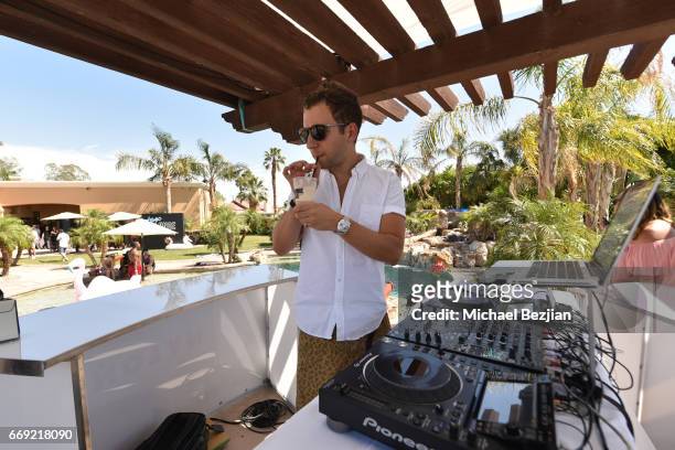 Equal sips on specialty Johnnie Walker adult root beer float at NYLON's The Happiest of Hours at the NYLON Estate on April 16, 2017 in Bermuda Dunes,...