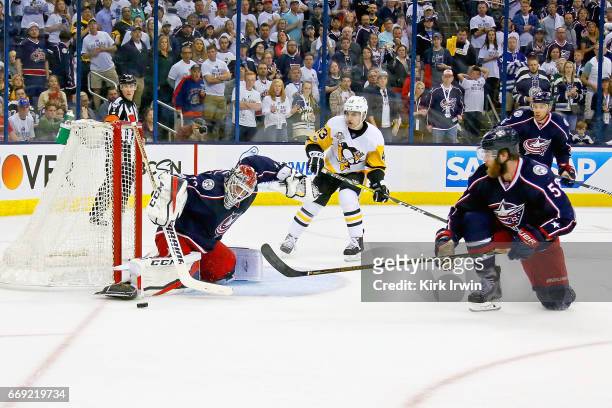 Goalie Sergei Bobrovsky of the Columbus Blue Jackets makes a save during the third period of the game against the Pittsburgh Penguins in Game Three...