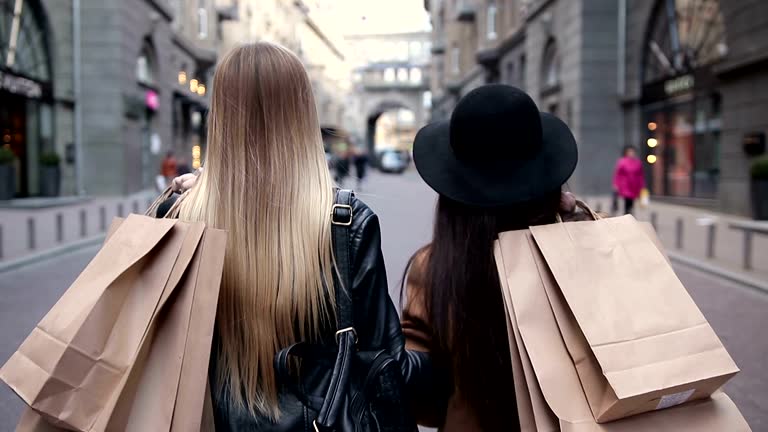 https://media.gettyimages.com/id/669223060/video/back-view-of-two-walking-women-with-shopping-bags.jpg?b=1&s=640x640&k=20&c=y8o-UdUZxrjFFJFb5WpgA9SIKtKAocJZ-uvqv1dLSQE=