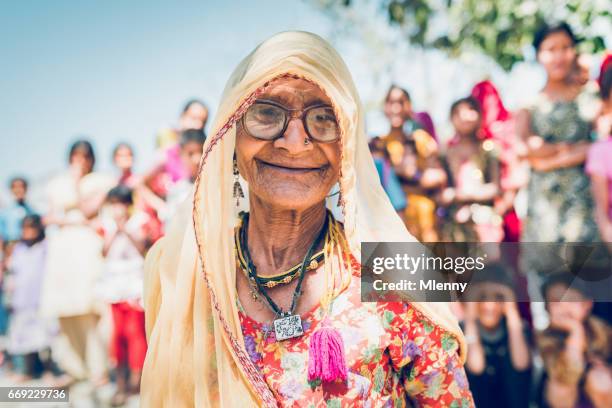 senior indian woman village real people portrait india - rural indian family stock pictures, royalty-free photos & images