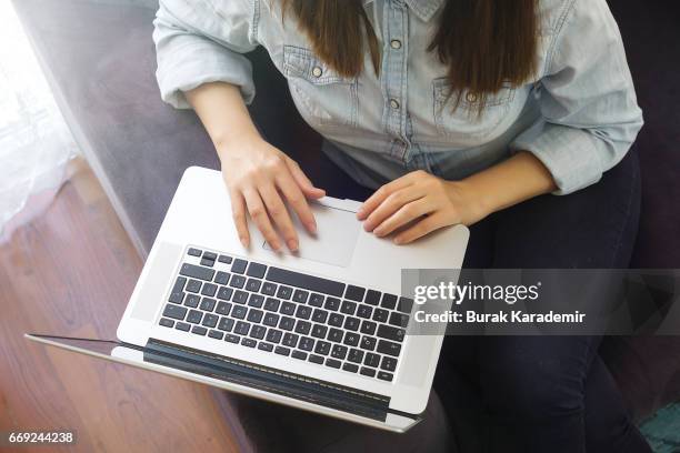 working on laptop - website blog stock pictures, royalty-free photos & images