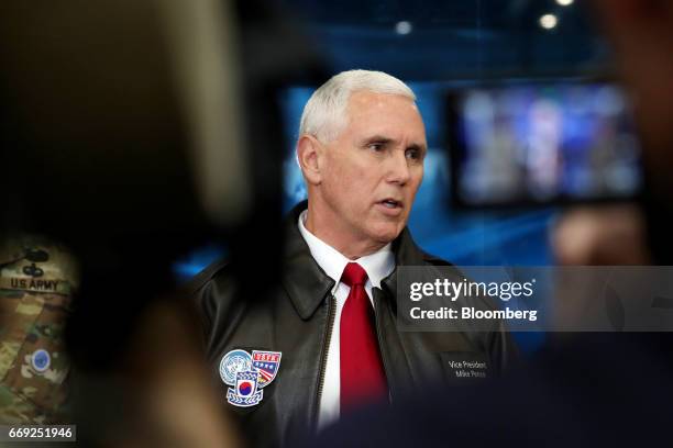 Vice President Mike Pence speaks to members of media at the truce village of Panmunjom in the Demilitarized Zone in Paju, South Korea, on Monday,...